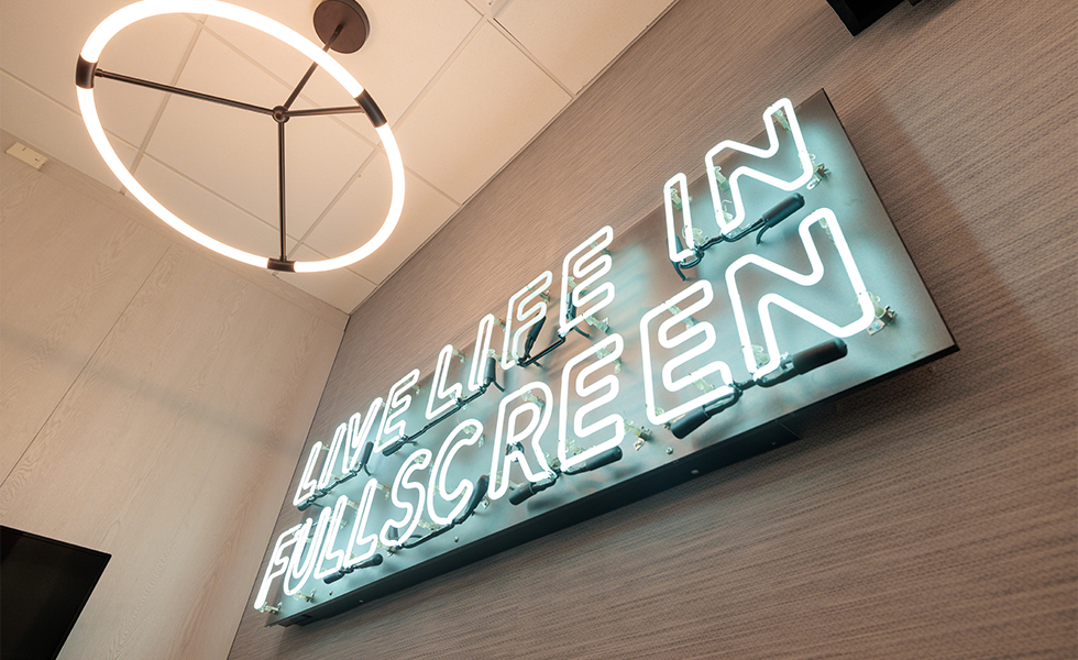 Fluorescent light letter sign that reads live life in fullscreen