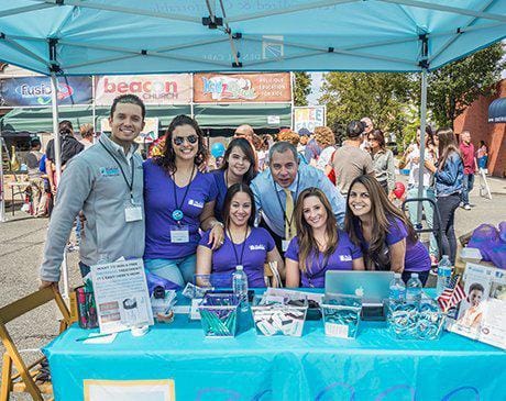 The Meadowbrook Dental Care dentists and team members at community event