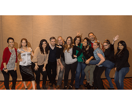 Dental team members laughing together