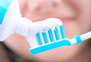 closeup of whitening toothpaste (for inexpensive teeth whitening section)