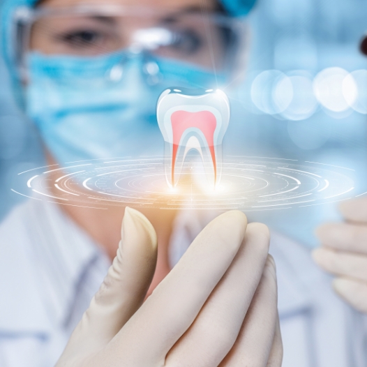 Dentist with a hologram of a tooth in their hand