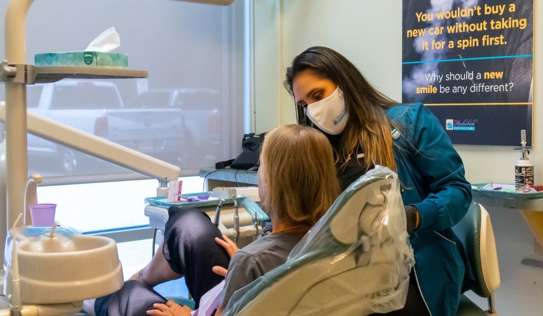 Dentist examining dental patient