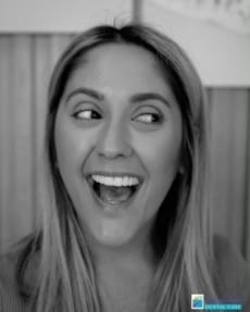 Woman showing off smile after dental care
