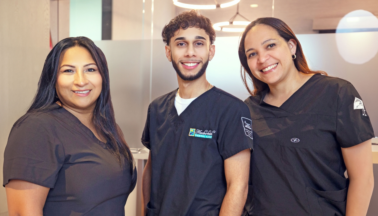 Four smiling dental team members at Meadowbrook Dental Care