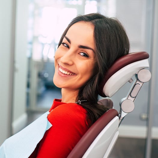 Smiling woman in dental chair