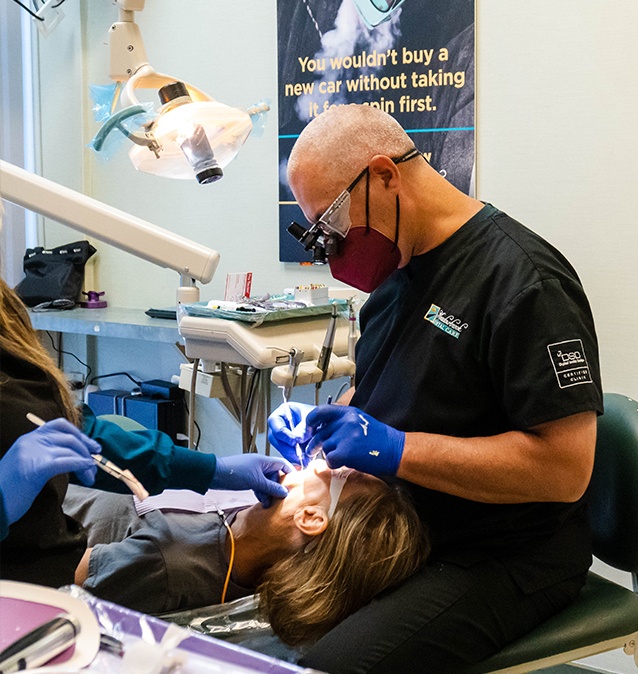 Doctor Casanas treating a dental patient