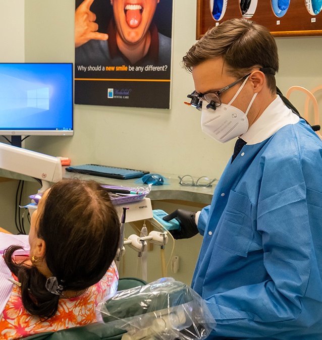 Doctor Casanas treating dental patient
